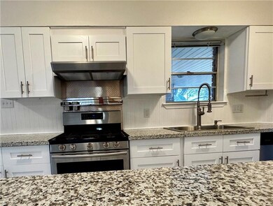 Granite counters, stainless appliances, gas stove
