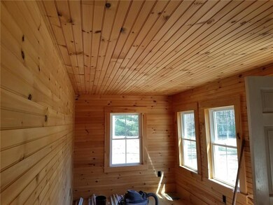 Enter through an updated pine...