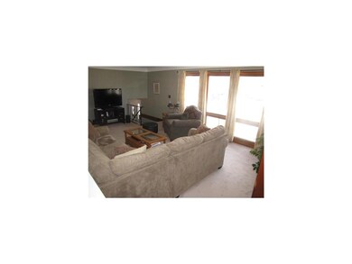 Living Room. The large living room features coved 