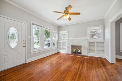 The main living area has shelves on either side of