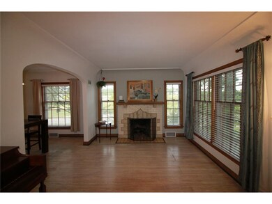 Living room with gas fireplace, extra large window