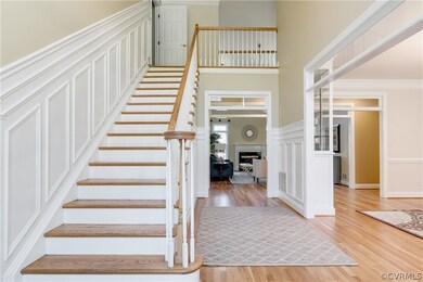 See the details in this foyer - wainscoting, pictu