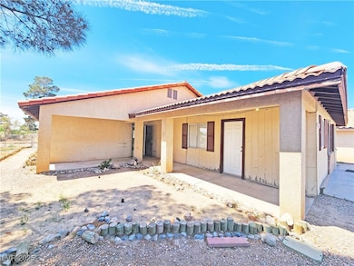 View of front of house featuring stucco siding and