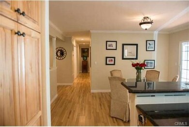View from Kitchen to Dining/ Entry & Hall