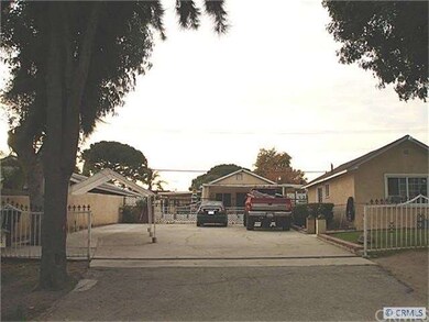Side yard with parking and additional unit/garage