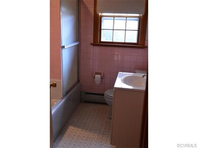 One of two vintage bathrooms.