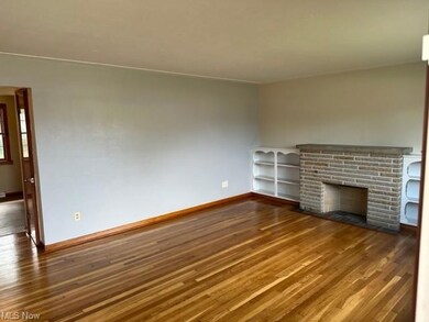 View of hardwood floored living room