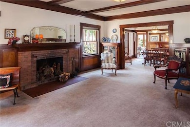 Living room opens to formal dining...