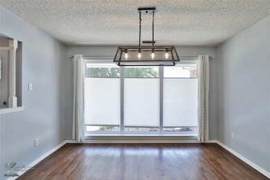 Unfurnished dining area featuring a notable chande