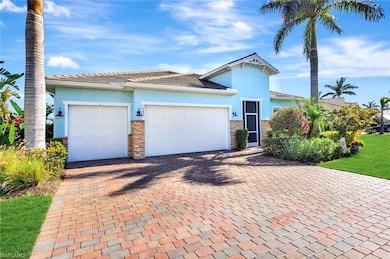 View of front facade with decorative driveway, an 