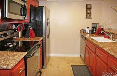 Travertine Floor, Newer Stainless Appliances