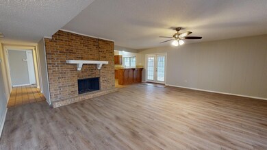Unfurnished living room with french doors, light w