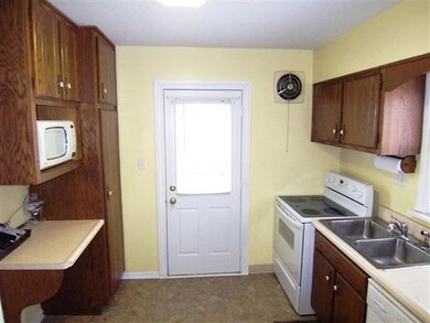 Modernized kitchen featuring a large pantry, writi
