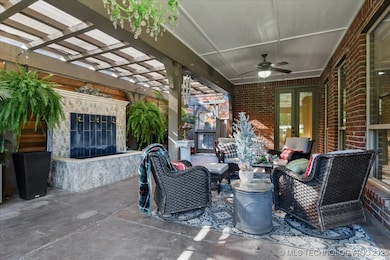 Elegant outdoor living with water feature.