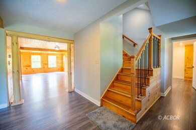 Stairs, view to family room and laundry
