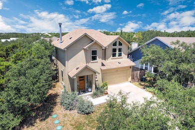 View of front facade featuring stucco siding, an 