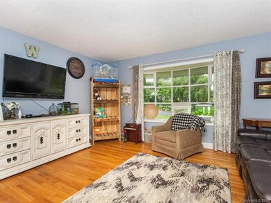 Main level living room with gorgeous hardwood floo