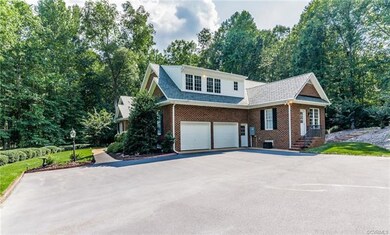 2 car attached garage with spacious driveway.