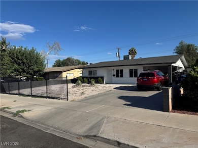 Single story home featuring driveway