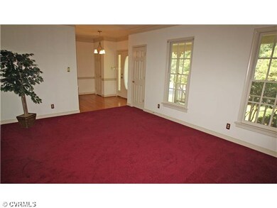 Living Room - Living room with carpet and crown mo