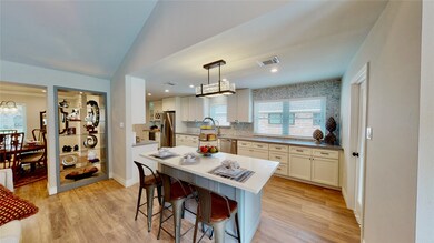 Another view of the kitchen coming in from the pat