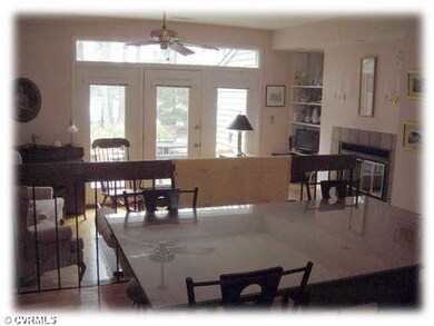 Dining Room - Dining area with hardwood floor is o