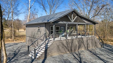 View of front of property featuring metal roof and