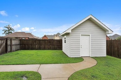 View of the 12X12 storage shed that has wooden she
