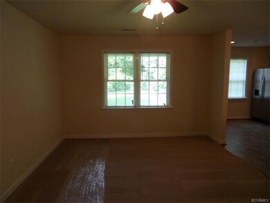 FAMILY ROOM IS OPEN TO KITCHEN AND DINING ROOM