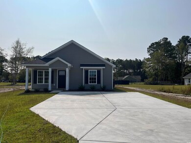 View of front facade with a front yard