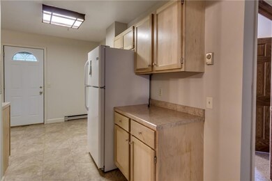 The full bathroom is very clean, with a one-piece