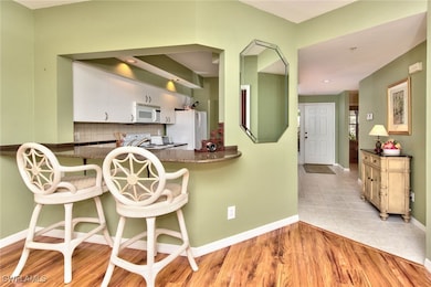 4200 Sawgrass Point Dr unit 101, Bonita Springs, FL 34134 - photo 6