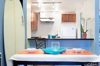 Dining Room and Kitchen Counter With Bar Stools