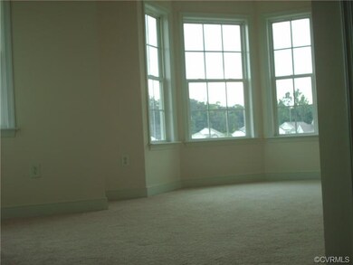 Master bedroom w/ bay window