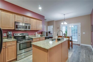 Spacious open eat-in kitchen makes entertaining fa