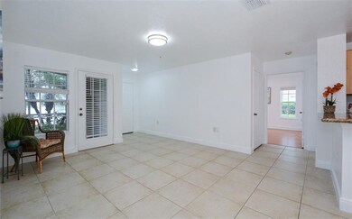Living room with tile flooring