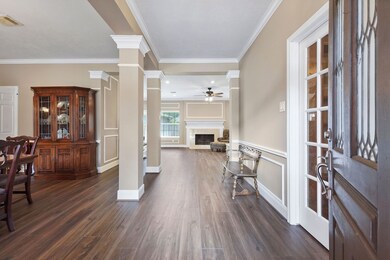 Open entry with formal dining to the left and home