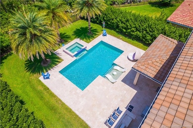 Green space, gorgeous pool and privacy!