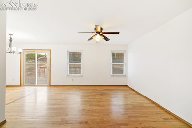 Spare room featuring light wood-style flooring, a 