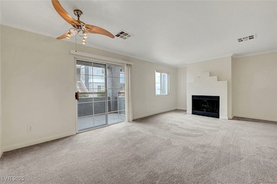Unfurnished living room with crown molding, ceilin