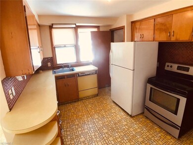 Kitchen includes appliances, original natural wood