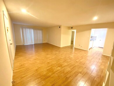 Huge living area with recent updated wood tile throughout