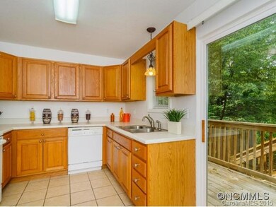 Large Kitchen Opens to Deck