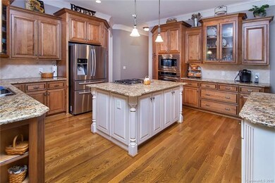 Gorgeous granite with cabinets galore.....