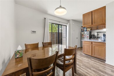 Dining area featuring light wood-style floors