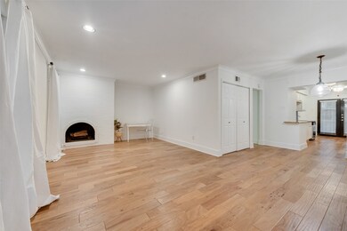 Wood burning fireplace, open living room
