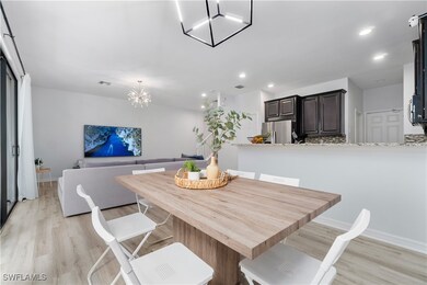 Dining room with light hardwood / wood-style floor