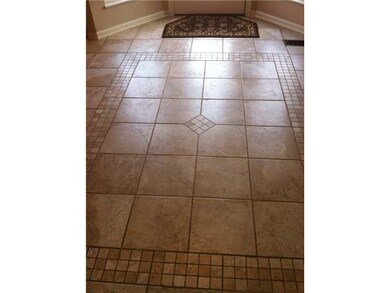 Kitchen. More custom tilework in the eat-in area of the kitchen