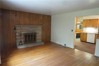 Another view of living room with a sneak peak into
