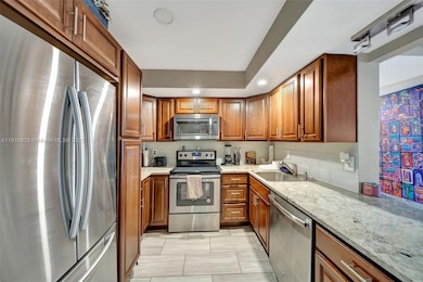 SS French Door refrigerator. Deep SS sink